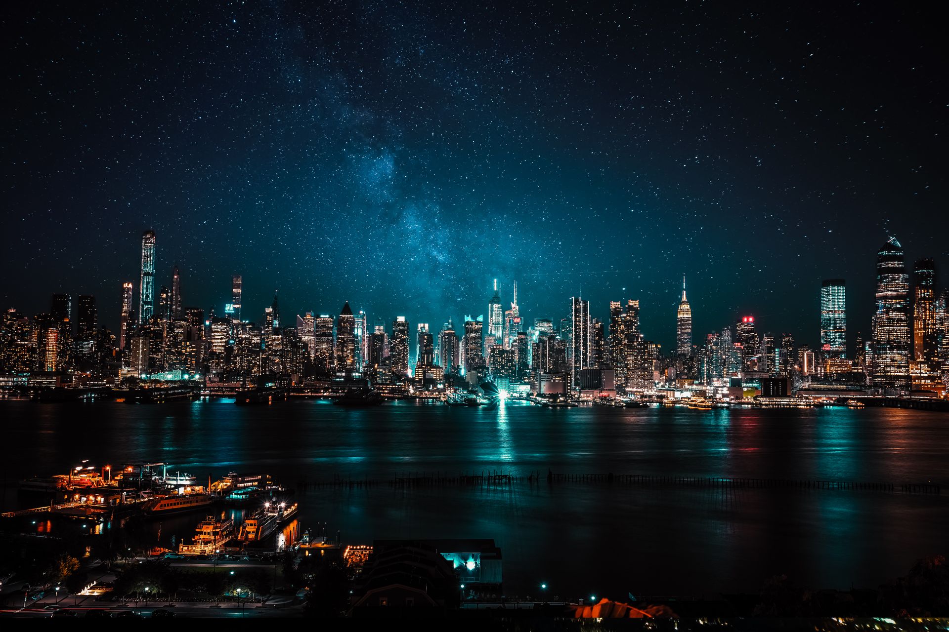 High-contrast dark cityscape at night representing INDU5TRY's media and marketing footprint